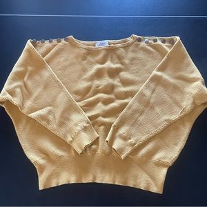 Pale yellow pull over sweater